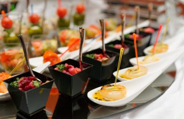 Catering Elegant finger food bites in a colorful and textured presentation, perfect for an event or corporate gathering.